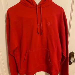 Red champion hoodie size medium in men’s